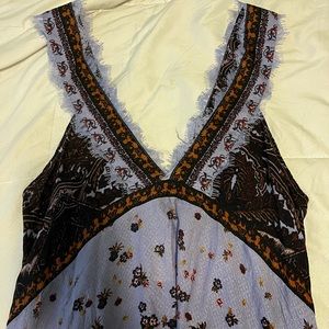 New free people dress with tags. Size large. Originally 100